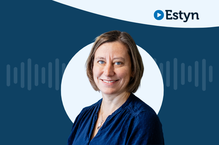 A portrait of a professional individual with the Estyn logo on the upper right, set against a dual-tone background of dark blue and white.